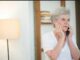 Arizona grandmother looking worried on the phone - Andrew Draayer of Andrew The Homebuyer can help